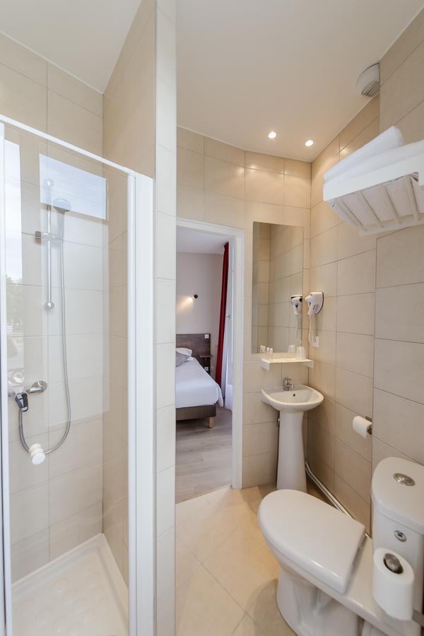 Logis Hotel - Le Petit Bellon ซ็องลิส ภายนอก รูปภาพ